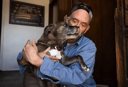 John Waudby, Founder of Nevada Animal Advocates, with his rescue dog